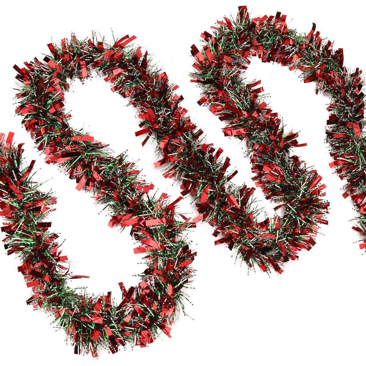 Red and green Christmas tinsel garland arranged in loops on a plain white background.